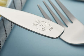 Exzact ANNOVA engraved dog bunny design adds personal fun to meals.