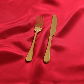 Eychei satin napkins in wedding setting enhance reception tables.