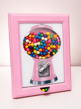 Eye Candy Frame close-up of the dispensing knob for easy treat release.