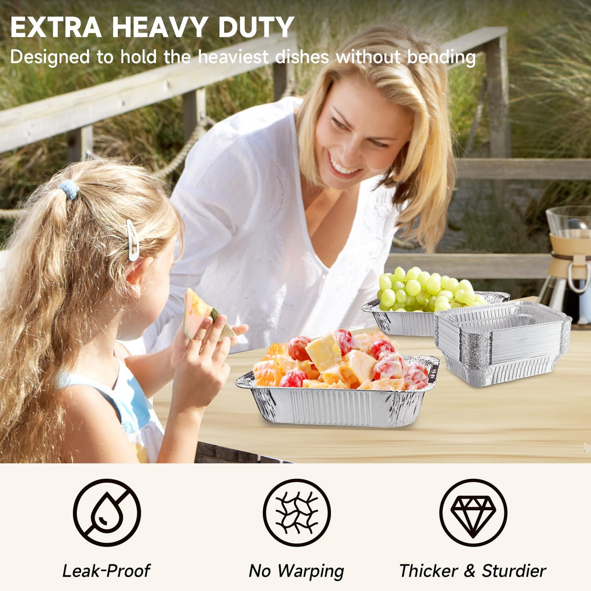 Ezsart aluminum pans placed in an oven for baking and reheating.