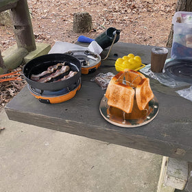 EZYoutdoor camping toaster stored in backpack for travel and trips