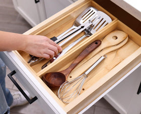 Fabsome bamboo flatware tray keeps cutlery neatly organized in a drawer.