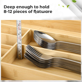 Fabsome bamboo silverware tray has deep compartments for knives and forks.