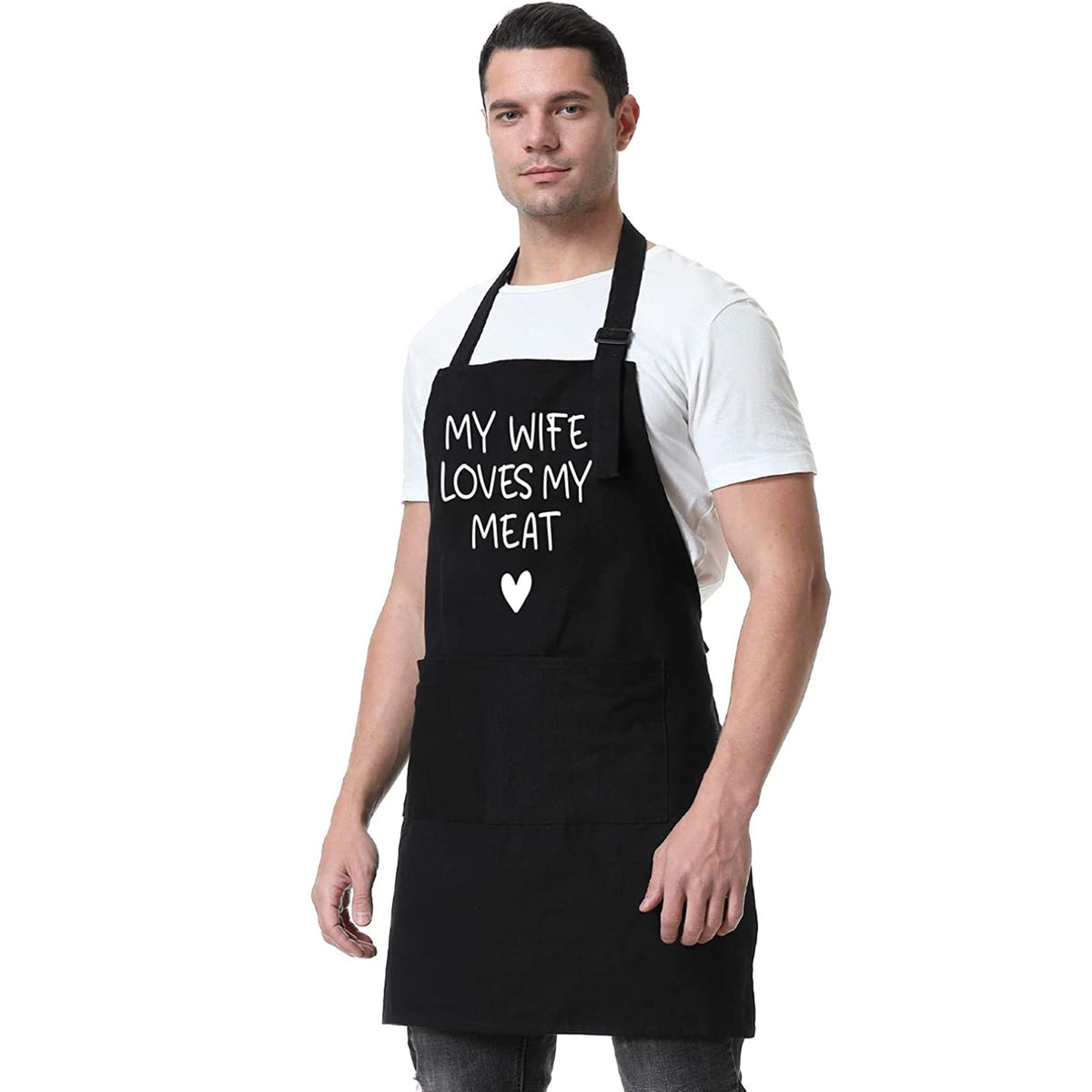 Fairy's Gift wearer grilling in the kitchen while wearing the apron
