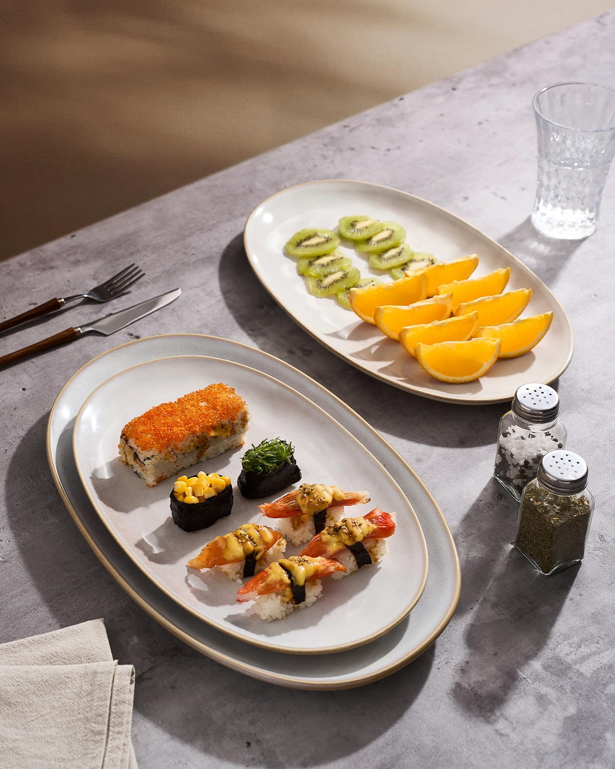 Famiware wave-design oval platter highlighting ripple texture for upscale presentation.