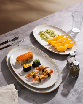 Famiware wave-design oval platter highlighting ripple texture for upscale presentation.