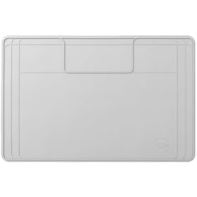 Famous Dino under-sink mat flat lay protects cabinets from leaks and spills