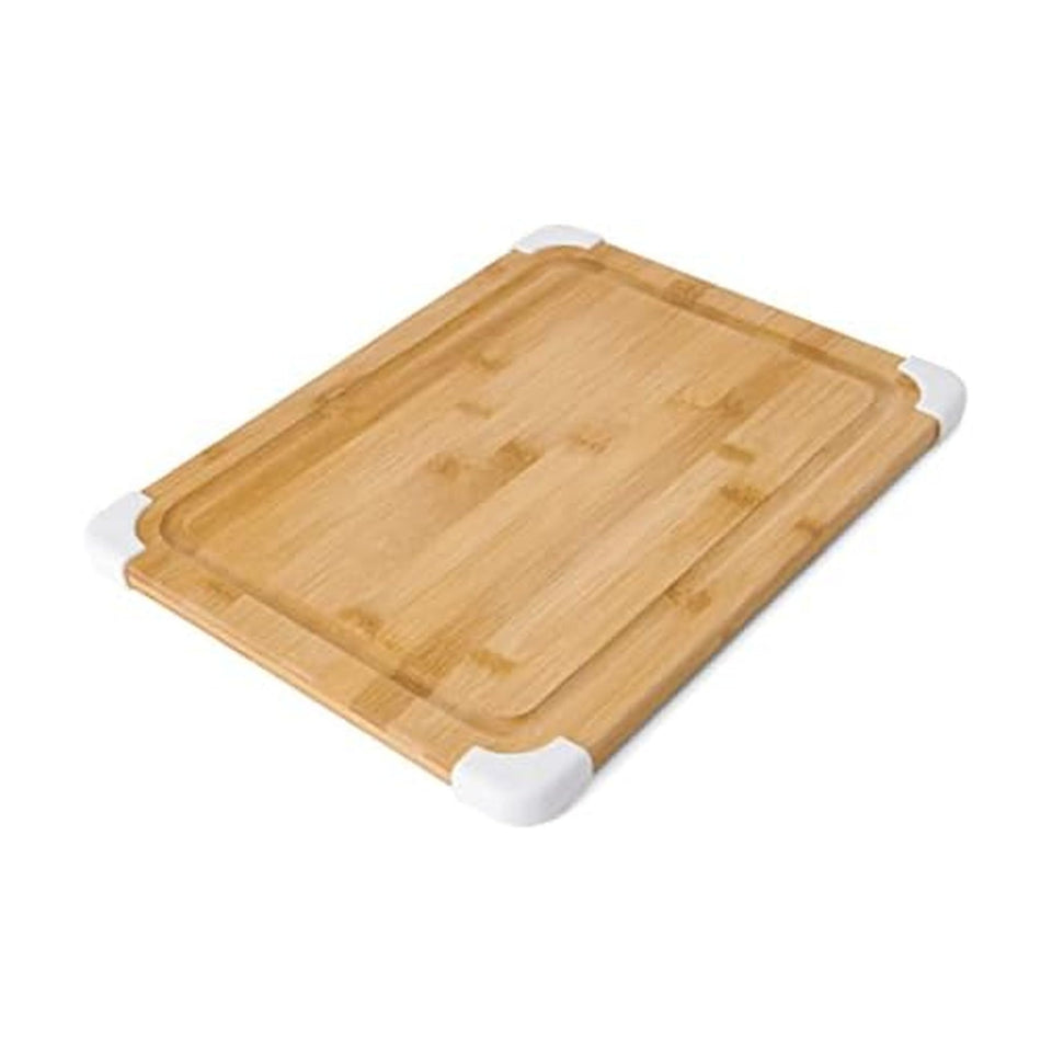 Farberware bamboo cutting board with juice groove catching liquids during prep
