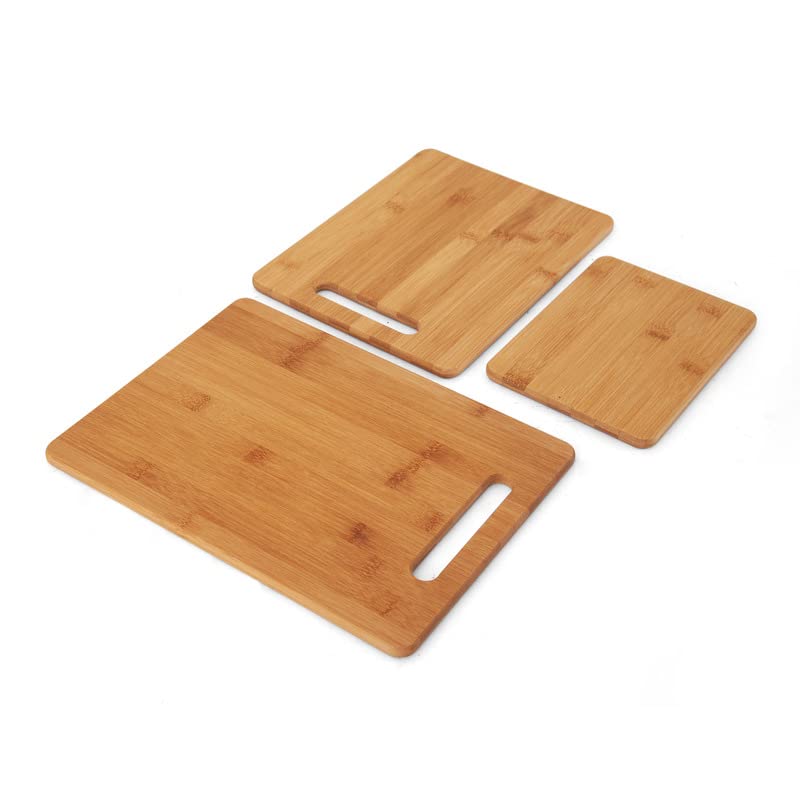 Farberware bamboo cutting board serving cheese and charcuterie on wood.