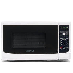 Farberware countertop microwave exterior on a kitchen counter enables quick meals in small spaces.