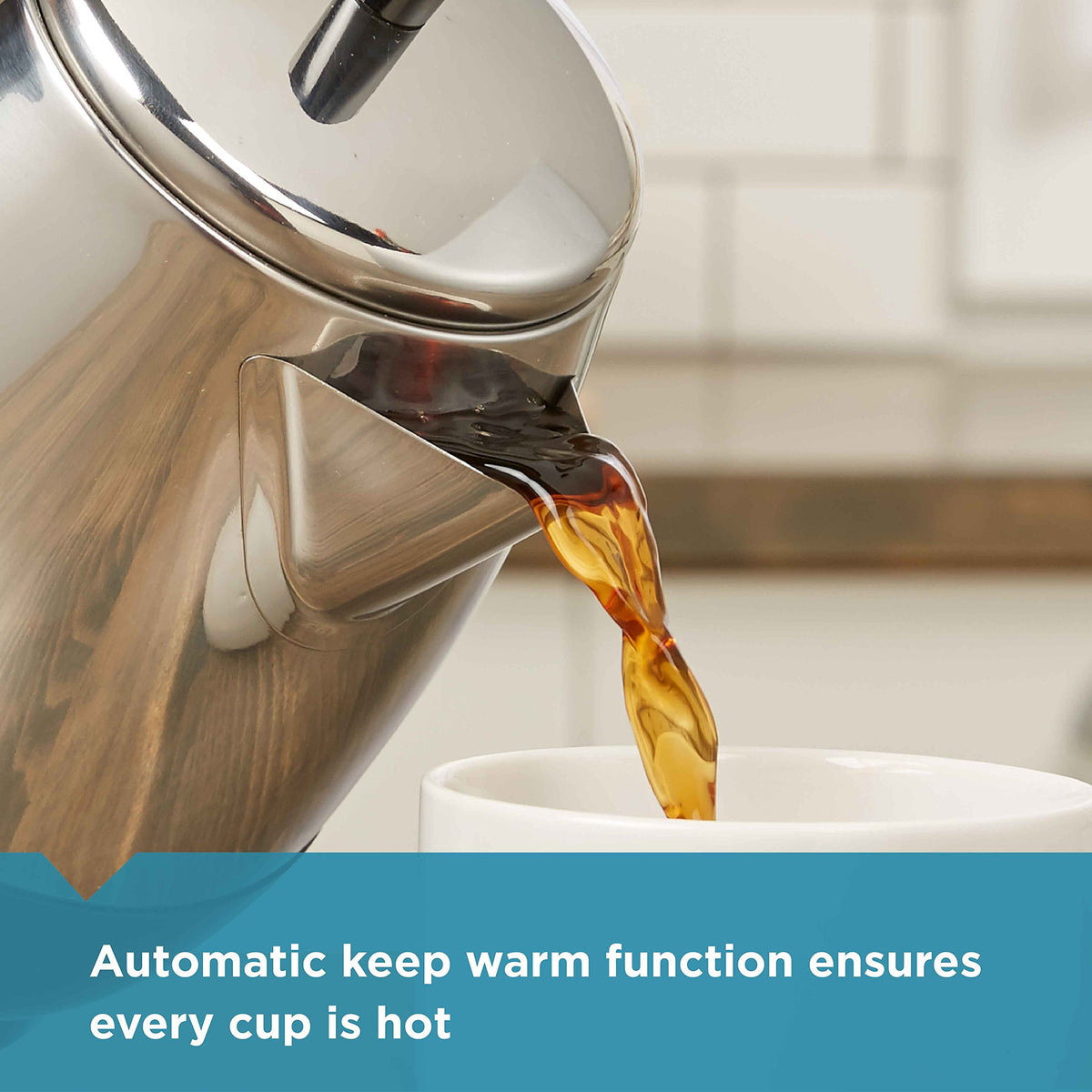 Farberware percolator side view shows cool-touch handle for safe, comfortable pouring.