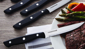 Farberware ergonomic triple-rivet handle detail for comfortable, precise cutting.