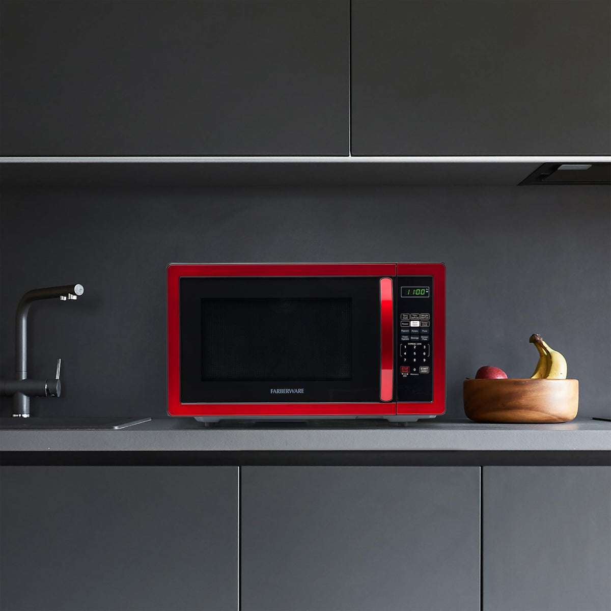 Farberware microwave compact design fits small kitchens or offices for versatile use.