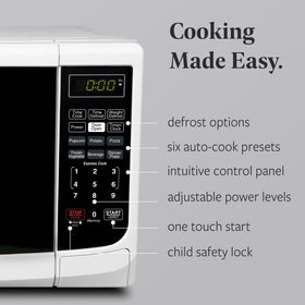 Farberware microwave digital display shows clock and countdown for precise timing.
