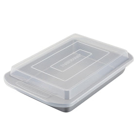 Farberware nonstick bakeware pan with lid, closed for easy transport of baked goods.