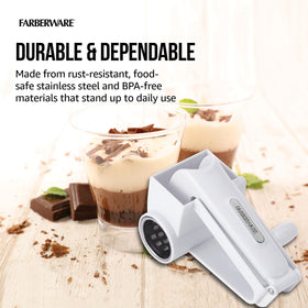 Grater shredding nuts and chocolate on Farberware drum.