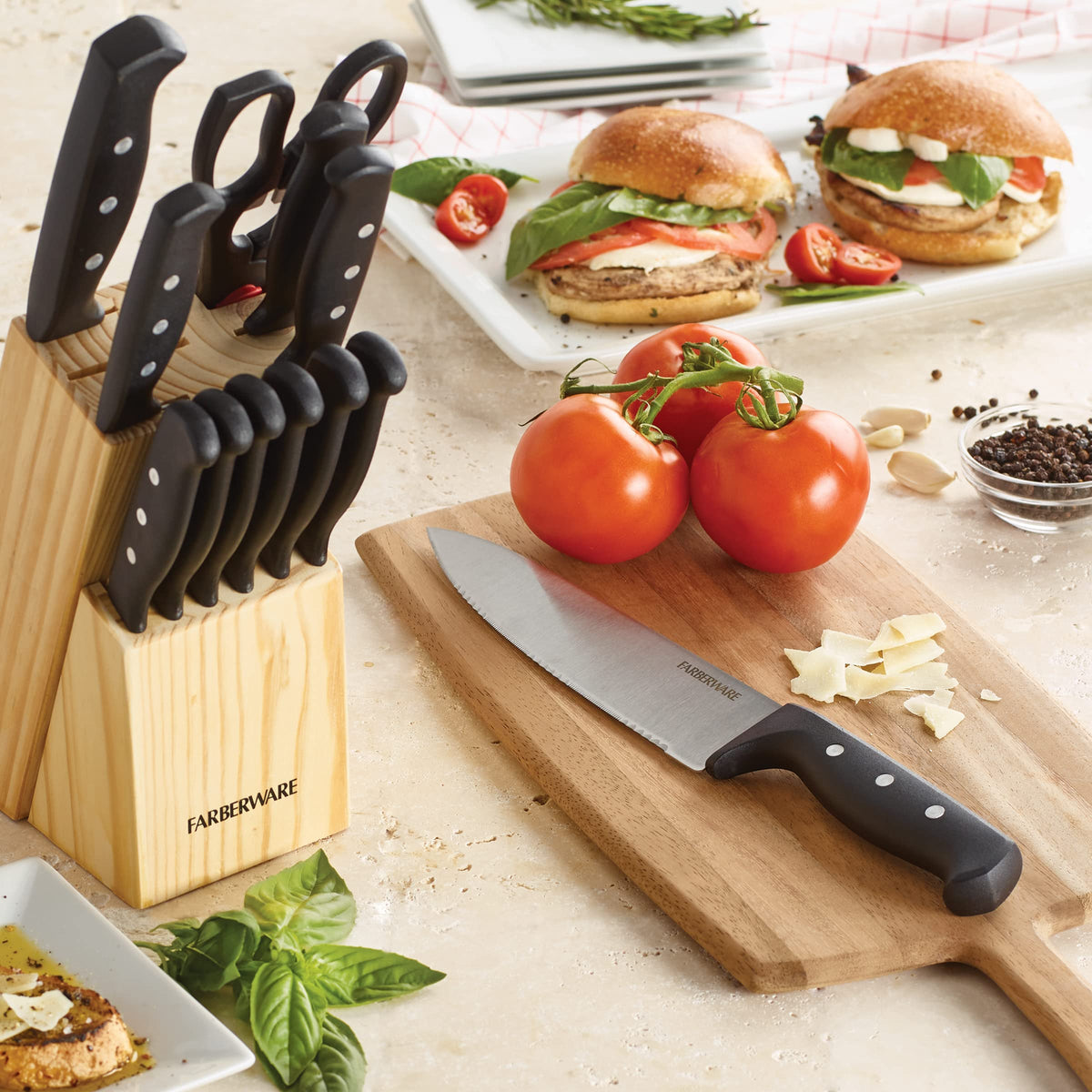 Farberware steak knives and tools arranged for easy dining prep.