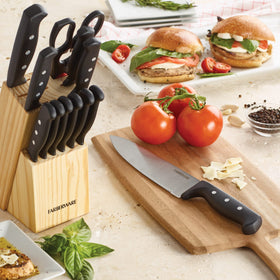 Farberware steak knives and tools arranged for easy dining prep.
