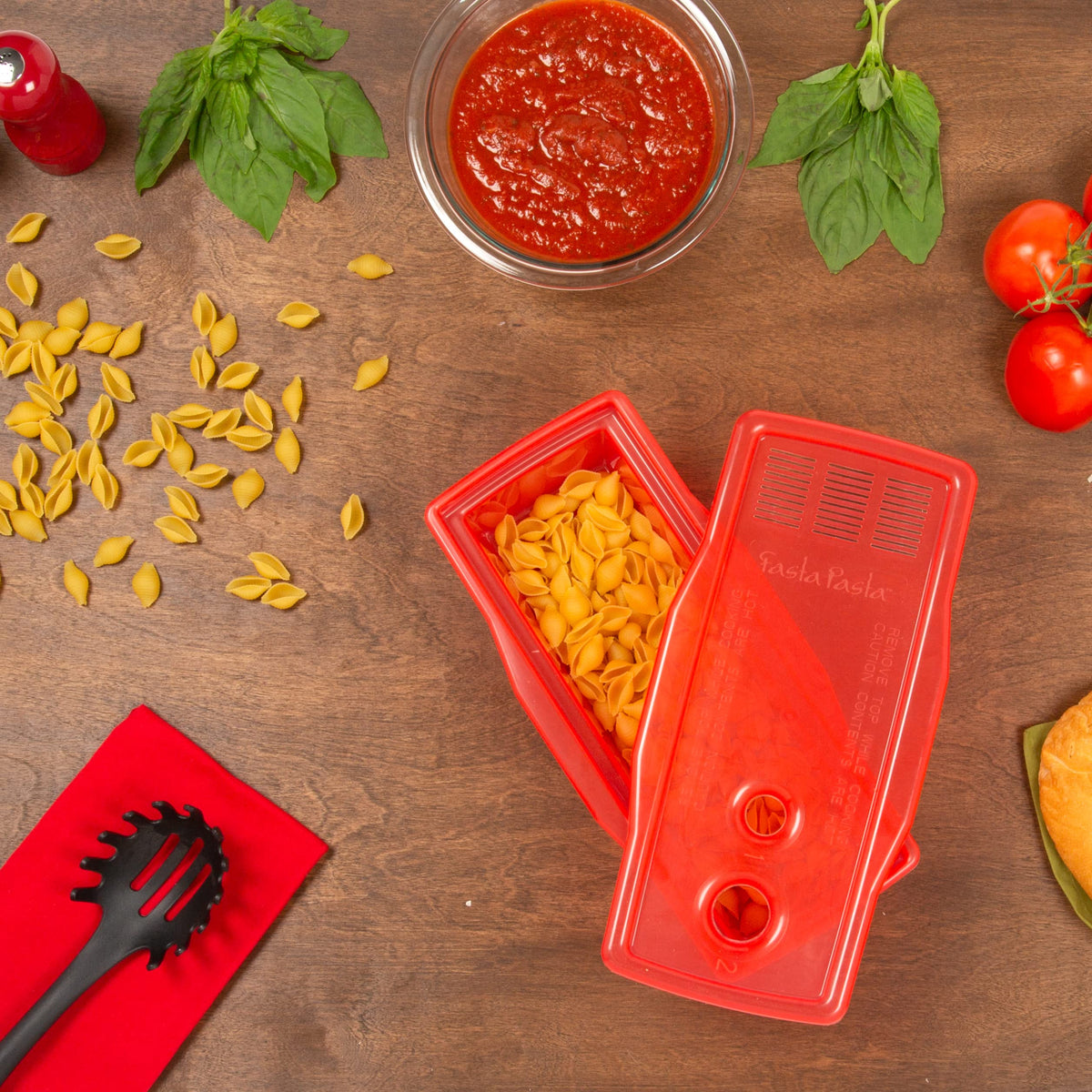 Dishwasher-safe red cooker ready for easy cleaning.