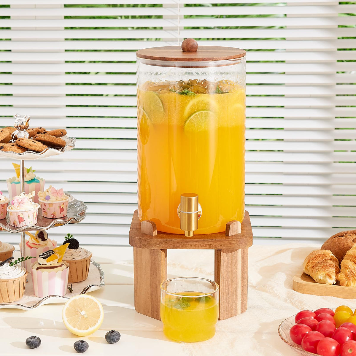 FavorFlavor dispenser filled with ice and fruit for refreshing lemonade or tea.