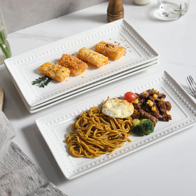 Feenmai four-piece set of rectangular serving trays for versatile party spreads.