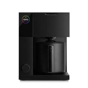 Fellow Aiden Precision Coffee Maker front view with matte black finish on the countertop.