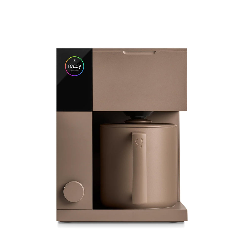 Fellow Aiden precision drip coffee maker with a thermal carafe for hot, flavorful coffee at home.