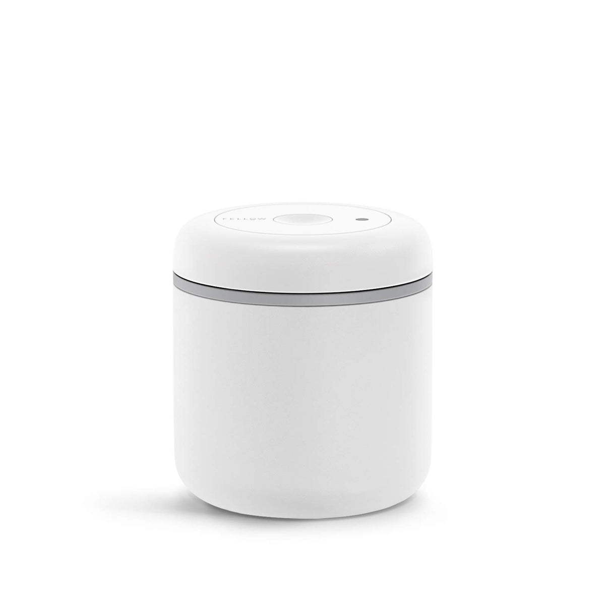 Fellow Atmos coffee canister on counter, compact 0.7 L bean storage.