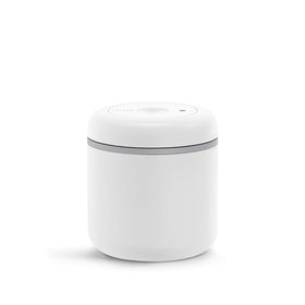 Fellow Atmos coffee canister on counter, compact 0.7 L bean storage.