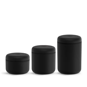 Fellow Atmos lid-twist action demonstrates easy air removal for longer-lasting beans.