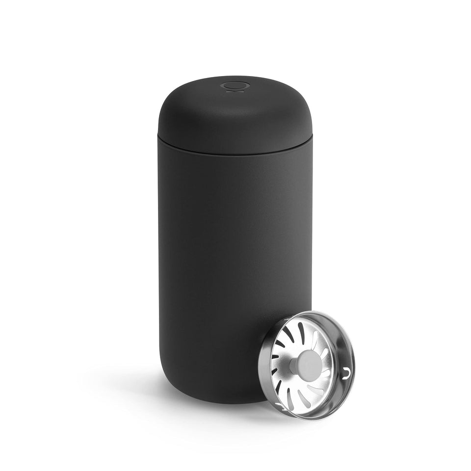 Fellow Carter Move mug with leak-proof lid keeps drinks secure during travel