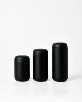 Fellow Carter Move swappable lids for versatile drink setups.