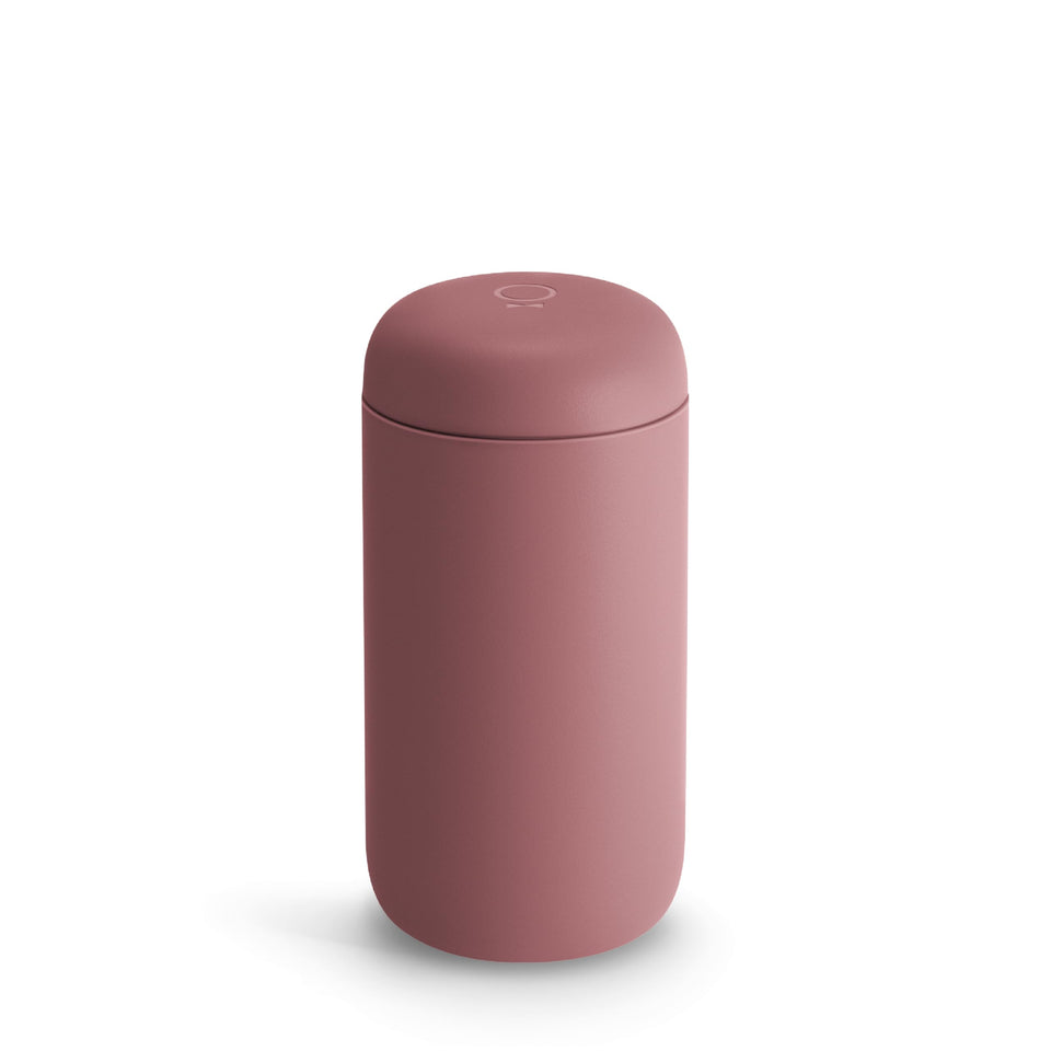 Fellow Carter Move travel mug in desert rose ceramic interior preserves flavor and warmth