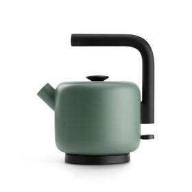 Fellow Clyde Electric Kettle glows while boiling water for tea and ramen.