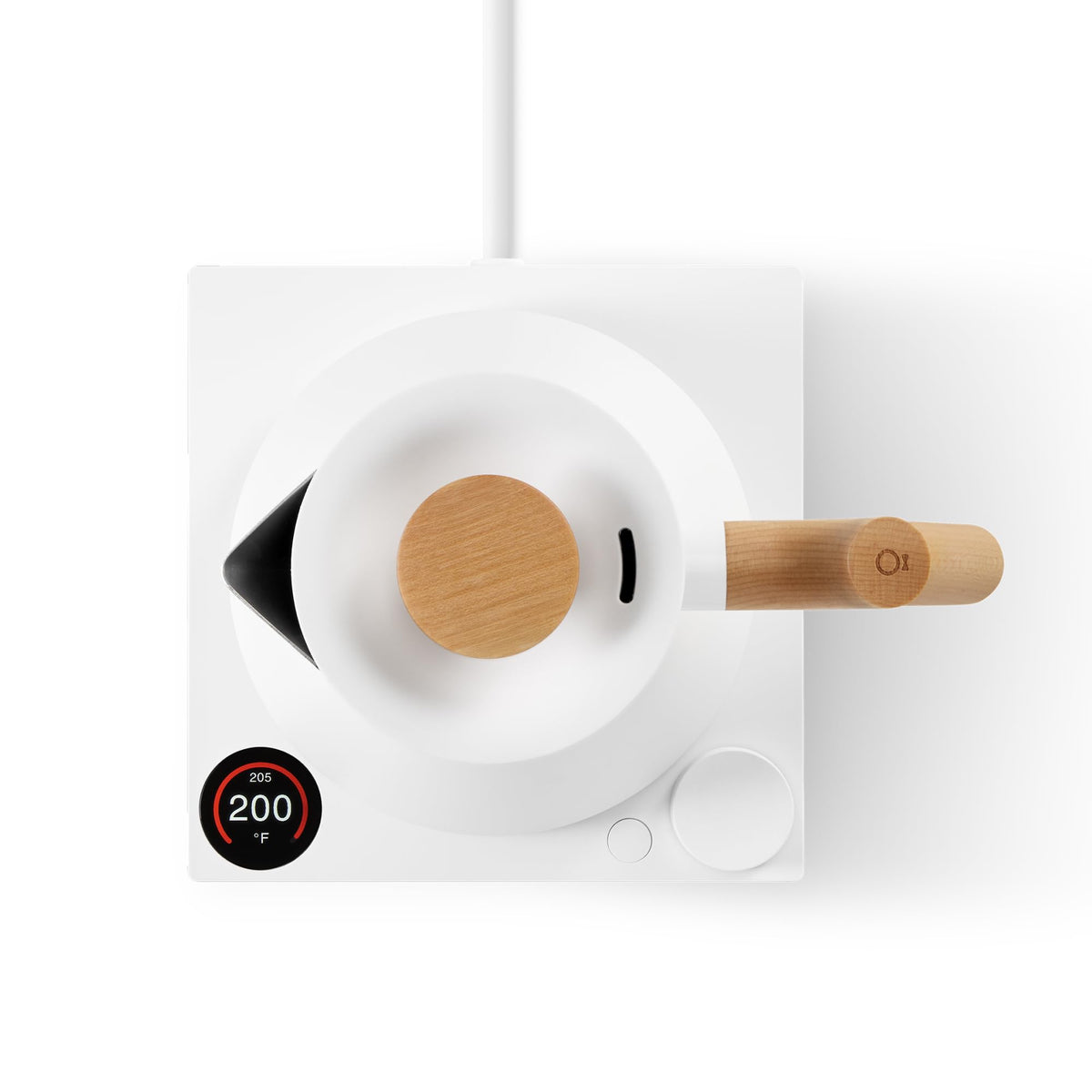 In-use shot of the Fellow Corvo EKG Pro brewing tea with timer visible on display.
