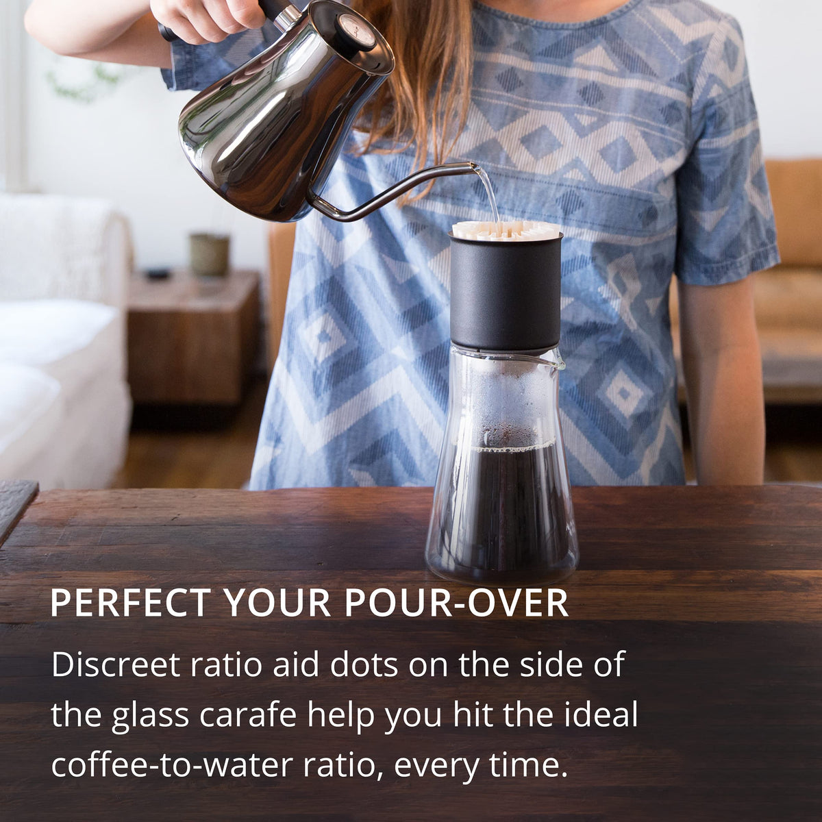 Fellow Stagg carafe with ratio dots guides precise pours for consistent servings.