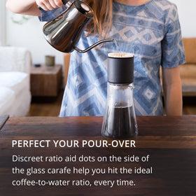 Fellow Stagg carafe with ratio dots guides precise pours for consistent servings.