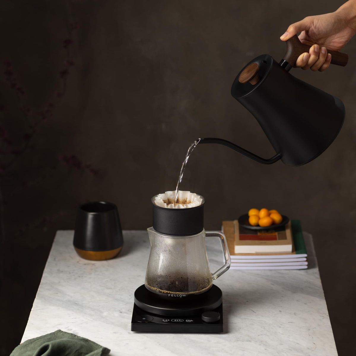 Fellow Stagg EKG Pro matte black body with walnut handle for comfortable pours