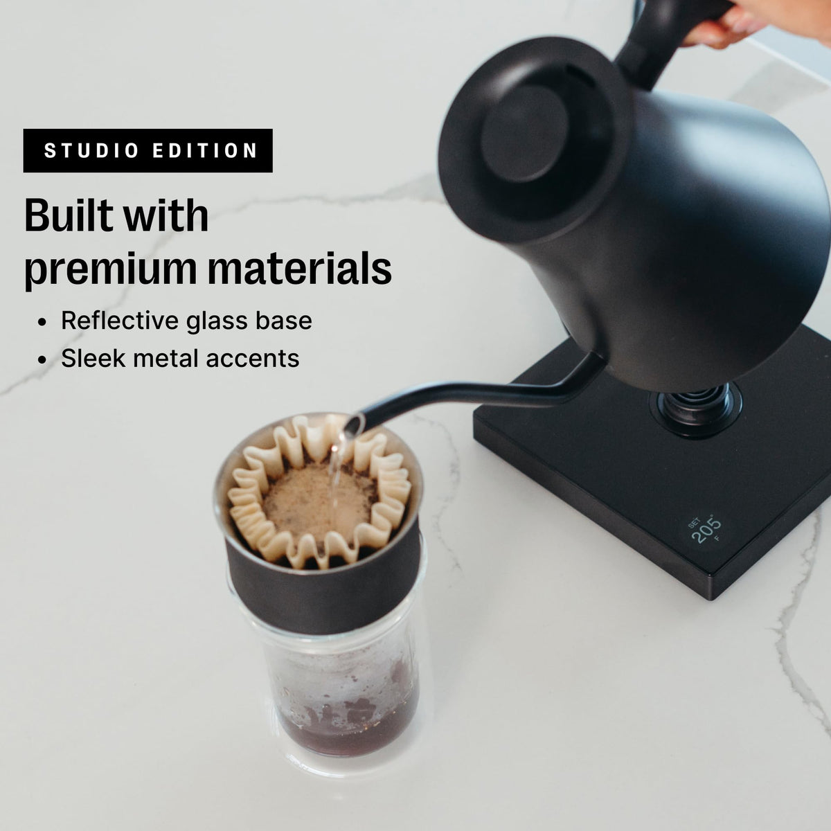 Precise gooseneck pour promotes even saturation for balanced extraction in pour-over coffee.