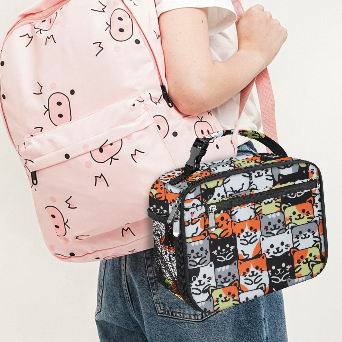 Multiple compartments of Femuar lunch box demonstrating roomy organization.