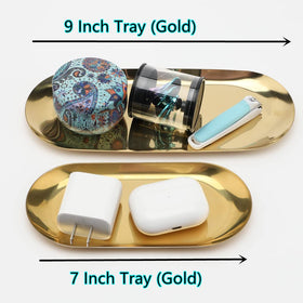 Fermus small-storage tray in gold enhances organization while matching modern decor.