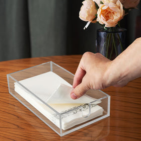 Fete acrylic napkin holder table setup showcases organized disposable towels within reach.