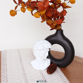 FEXIA cream macrame runner on bedroom dresser creates cozy accent.