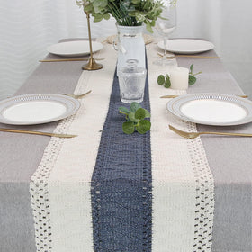 FEXIA boho table runner folded in packaging showing creases before flattening.