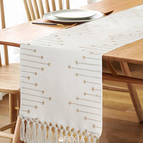 FEXIA table runner set up for a wedding reception table with boho flair.