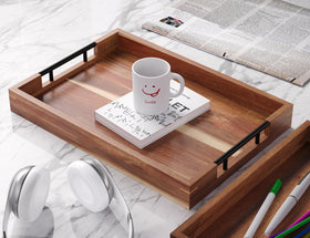 Fibogollo acacia wood tray set up for drinks and snacks at a party.
