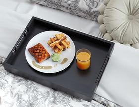 Fibogollo bamboo tray close up shows smooth lacquer finish and natural grain.