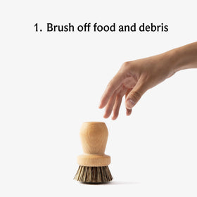 Field Company natural fiber brush with beech wood handle for thorough yet gentle cleaning.