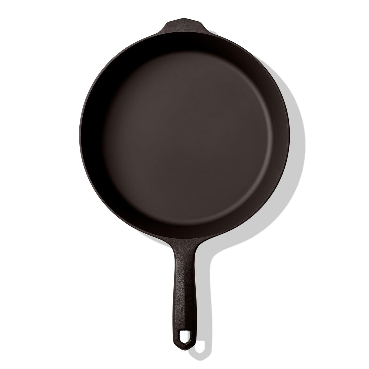 Field Company medium cast iron skillet on stove showing even heat and control