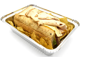 Fig & Leaf takeout pan with lid closeup showing secure snap design